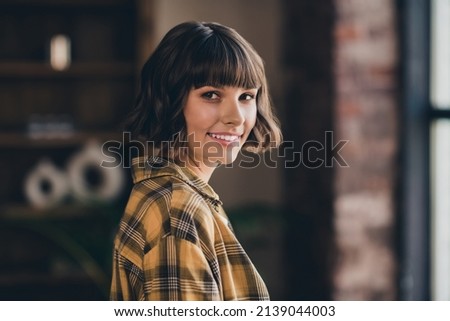 Profile photo of nice millennial bob hairdo lady wear yellow shirt at home in flat alone Royalty-Free Stock Photo #2139044003