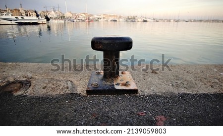 metal pylon mooring on the port pier
