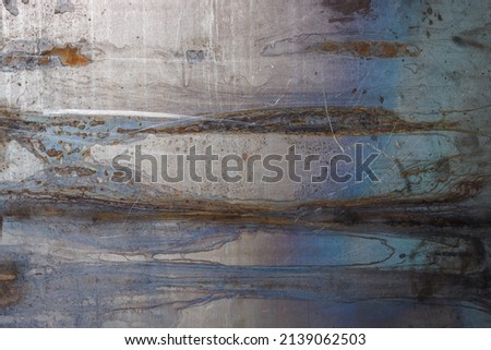 raw flat sheet steel texture and background with stains and discoloration.