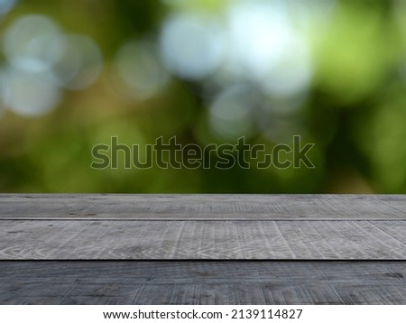 Plank counter with green forest bokeh blur background, concept, product presentation and advertisement, product promotion.