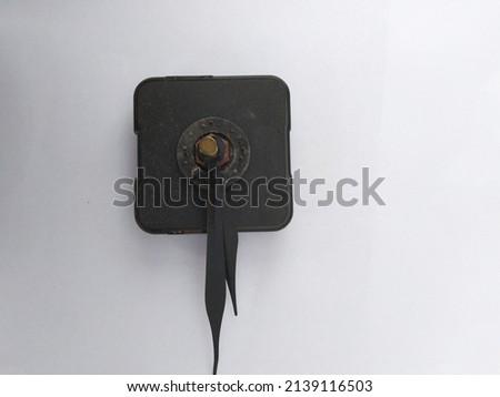 The broken black wall clock machine with white background