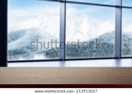 window in hotel and dark desk 