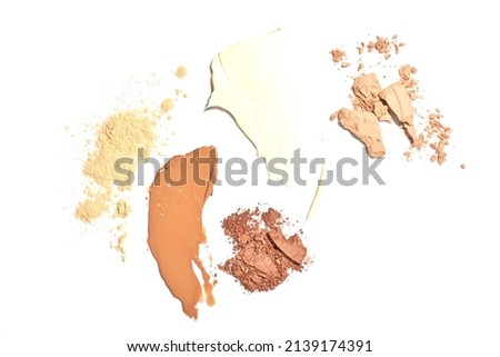 collection of various make up creams samples isolated on white background