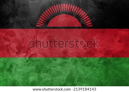 Textured photo of the flag of Malawi.