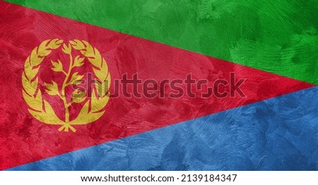 Textured photo of the flag of Eritrea.