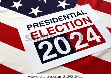 Presidential Election 2024 Written over Waving American Flag Royalty-Free Stock Photo #2139210411