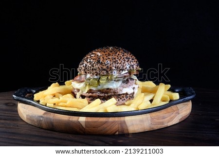 beef burger sandwich bread salad cheese and onion Royalty-Free Stock Photo #2139211003