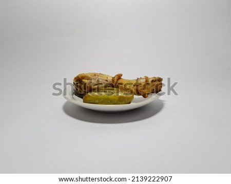 Photo with pictures of fried tofu, fried chicken and eggplant