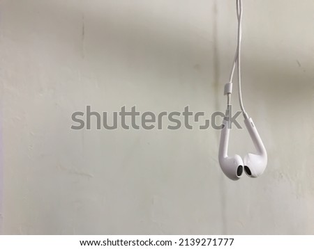 white earphones isolated on white background with copy space background