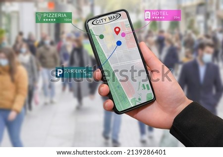 Photo showing technology being used for navigation and location based apps
