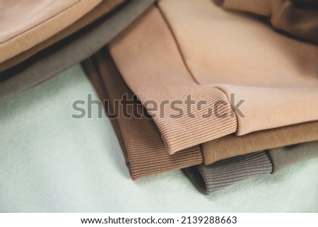 Elements and details of knitwear in different colors close-up. Selective focus Royalty-Free Stock Photo #2139288663