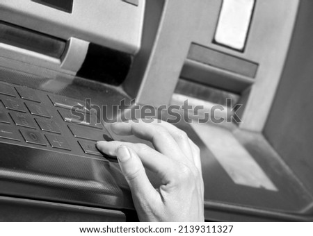 drawing money cash ATM point dispenser in town bank stock photo 