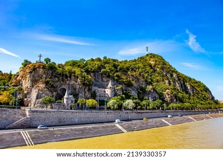 Liberty Statue and the Cave Church on the Gellert Hill in Budapest, Hungary Royalty-Free Stock Photo #2139330357