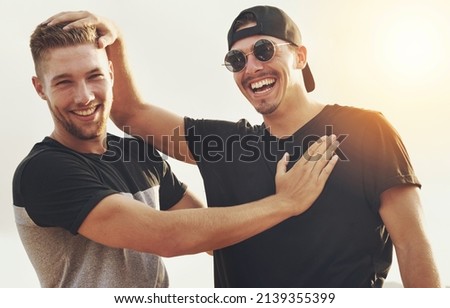 My wingman of choice. Portrait of two happy friends enjoying the day outside together. Royalty-Free Stock Photo #2139355399