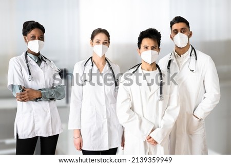 Medical Healthcare Doctor Group In Hospital Wearing FFP2 Face Mask