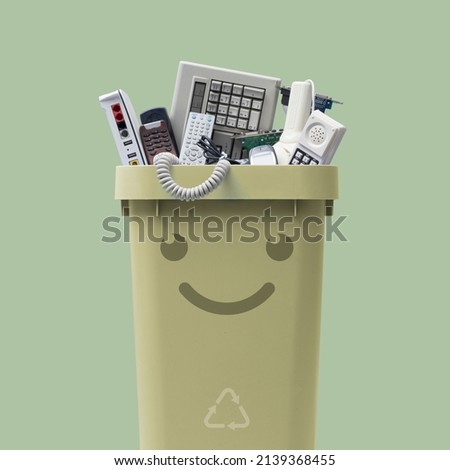 Recycling bin full of electronic waste, smiling cute character