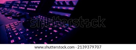 Video editing controller machine for color edit in post video production. Many button control panel for telecine adjust color on digital video movie or film in post production stage. Editor tools. Royalty-Free Stock Photo #2139379707