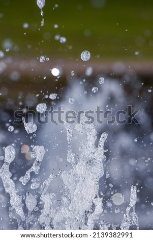 Slowmotion Water spray from a fountaion on a clear day using high shutter speed