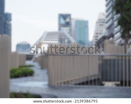 Creamy white fence wallpaper and blurred buildings as a background