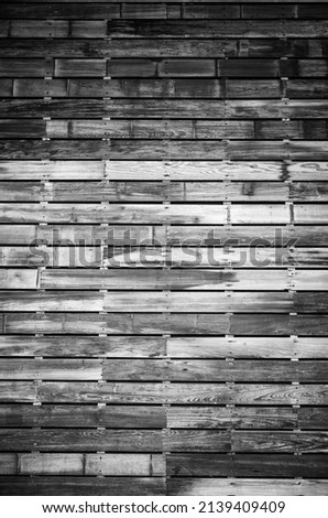 Plank Wood Wall with Spacers in Black and White.  Title page or cover photograph also useful I'm panorama mode.