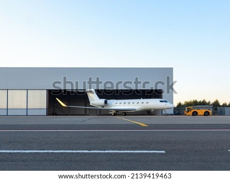 One of the most expensive and prestigious private jets in the world. Ground handling preparations for the flight. American made model Royalty-Free Stock Photo #2139419463
