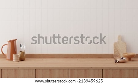 Minimal cozy counter mockup design for product presentation background or branding with bright wood counter  tile white wall with orange brown jug mug chop fork spoon bowl. Kitchen interior  Royalty-Free Stock Photo #2139459625