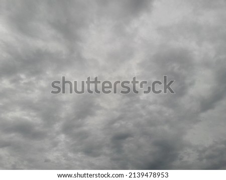 Gray clouds in a cloudy sky