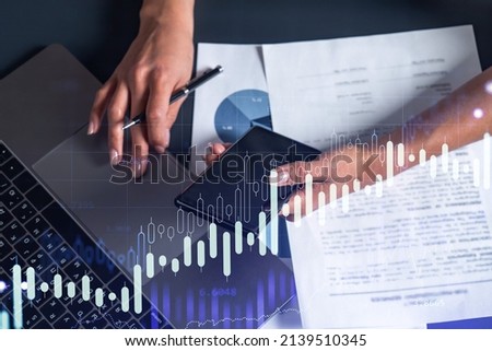 Woman hands typing the keyboard to research stock market to proceed right investment solutions. Internet trading and wealth management concept. Casual wear. Hologram Forex chart over close up shot
