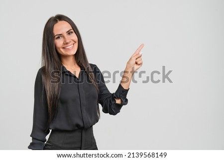 Successful confident smart caucasian young businesswoman freelancer boss CEO bank manager worker employee looking at camera pointing at copy space in formal clothes isolated in white Royalty-Free Stock Photo #2139568149
