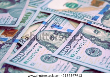 Cash hundred-dollar bills, banknotes are scattered dollar background image.