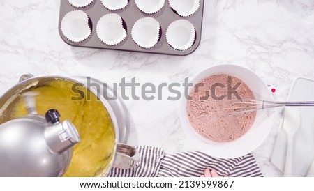 Flat lay. Step by step. Mixing ingredients in a standing kitchen mixer to bake red velvet cupcakes.