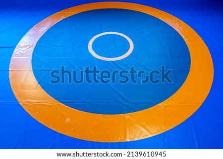 Blank wrestling mat template with text space for customization