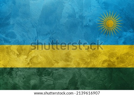 Textured photo of the flag of Rwanda.