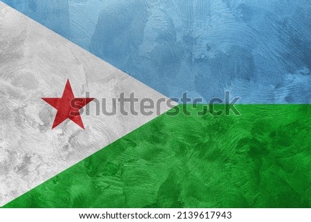 Textured photo of the flag of Djibouti.