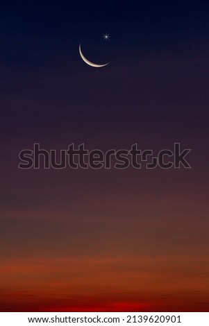 Crescent moon and star on dusk sky in the evening on twilight religion of Islamic begin Ramadan month and free space for text Eid Al Adha, Eid Al Fitr, Muharram Royalty-Free Stock Photo #2139620901