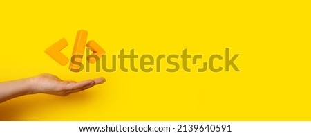 Programming 3d render code icon.  Programming code symbol in hand. Coding or Hacker background. Development and software concept.
