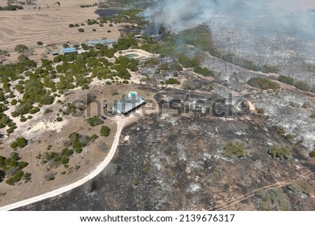 Comfort, Texas March 25th 2022: Aerial picture of the Sakewitz fire near Comfort Texas with heavy smoke and many burned down areas