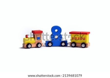 Very colorful toy wooden train with the number eight. Love and happiness birthday celebration, performance illustration, online educational toy. early learning