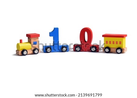 Very colorful toy wooden train with the number ten. Love and happiness birthday celebration, performance illustration, online educational toy. early learning