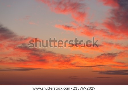 Beautiful scarlet clouds at sunrise.