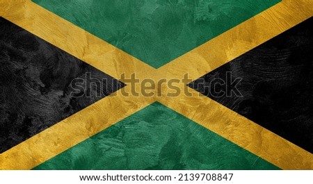 Textured photo of the flag of Jamaica.