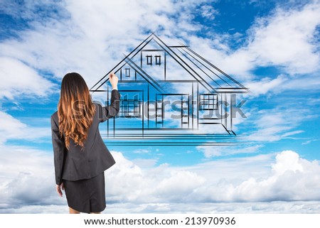 real estate, accomodation and technology concept - smiling woman drawing house on virtual screen