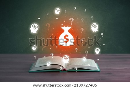 Open book with business icons above