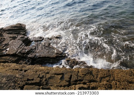 Landscape with water and rocks in Thassos island, Greece, next to the natural pool called Giola Beautiful textures and details