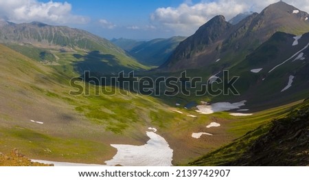 mountain valley in snow, outdoor travel scene