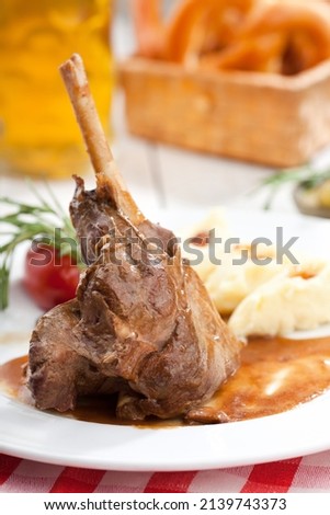 Meat on the bone, ribs. Food photography, light background