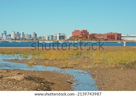 Beach of Squantum point park with background of Boston skyline Quincy MA USA