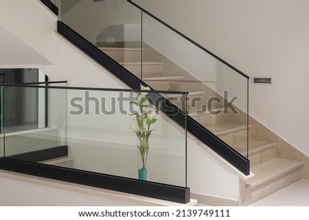 white interior with glass fence and stairs Royalty-Free Stock Photo #2139749111
