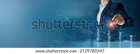 
Businessman draw growth graph analysing stock market profit on global business investment. Banking, financial planning management strategy for business growth and success on data networking. Royalty-Free Stock Photo #2139780347