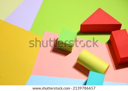 Sponge blocks colourful house shot from top. Kids toys blocks
